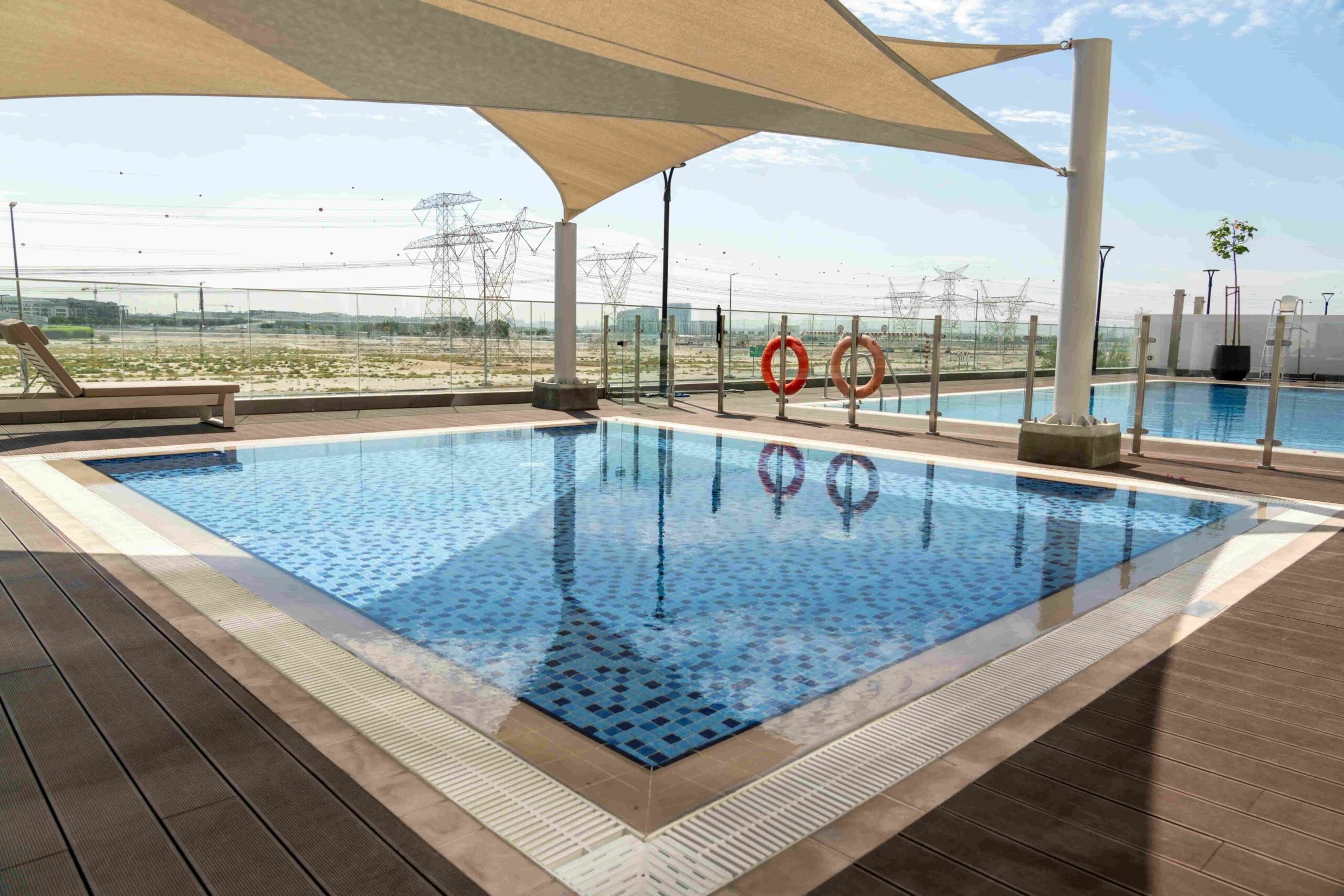 A community pool filled by bulk water delivery