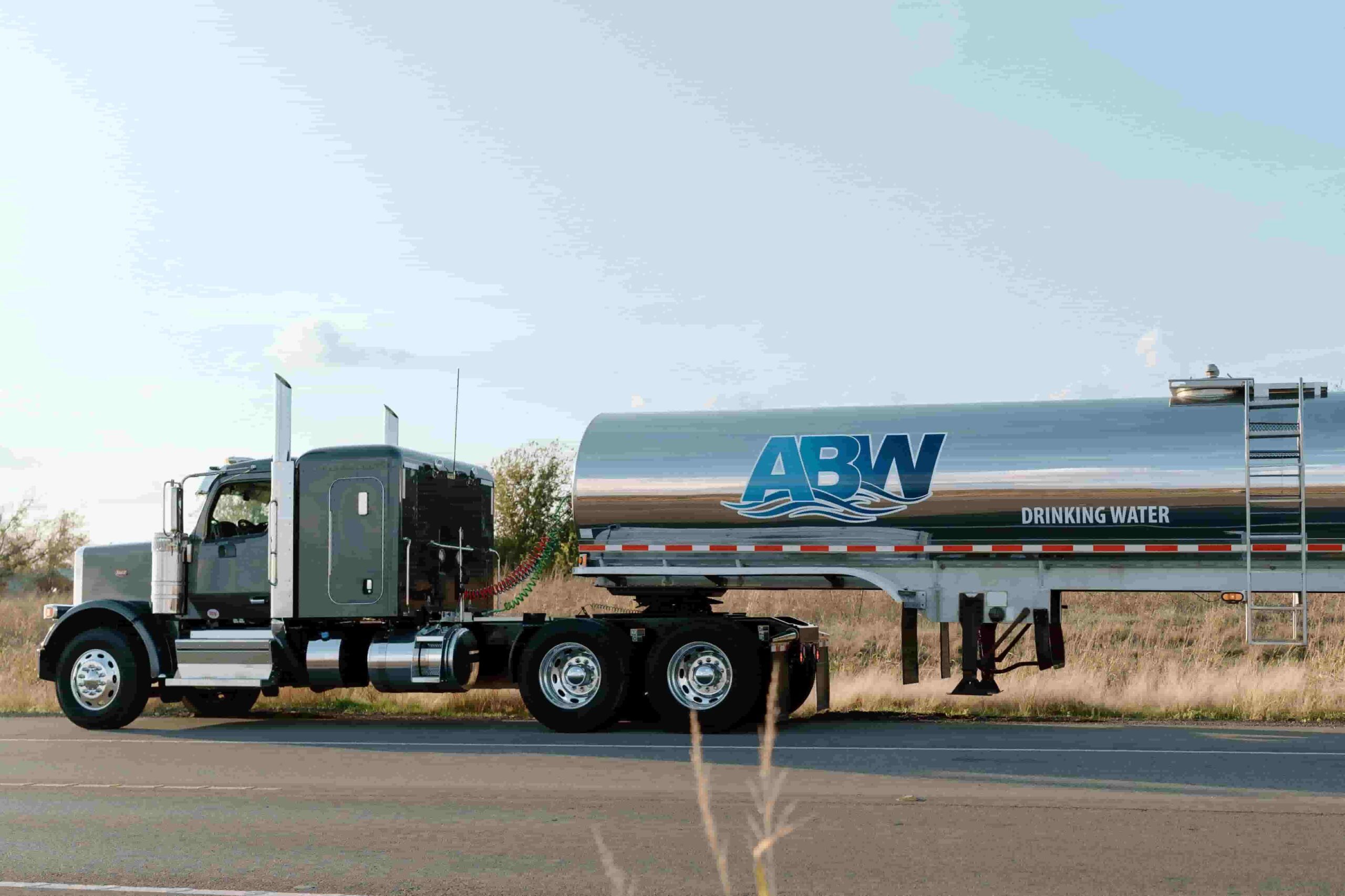 A large capacity water tanker delivering bulk water in Austin, TX.